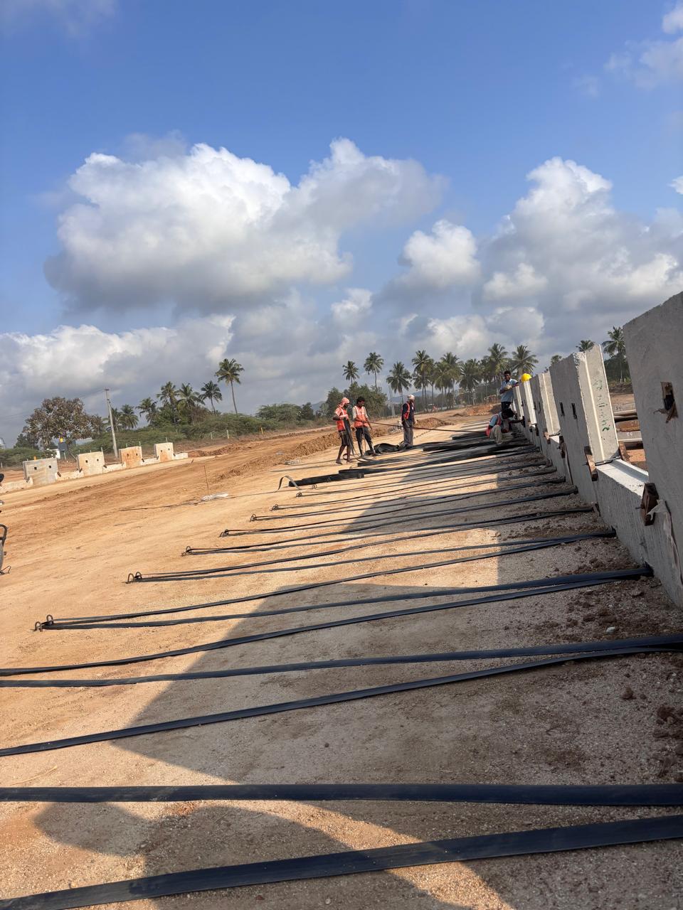 Road formation works with geogrid laid on subgrade